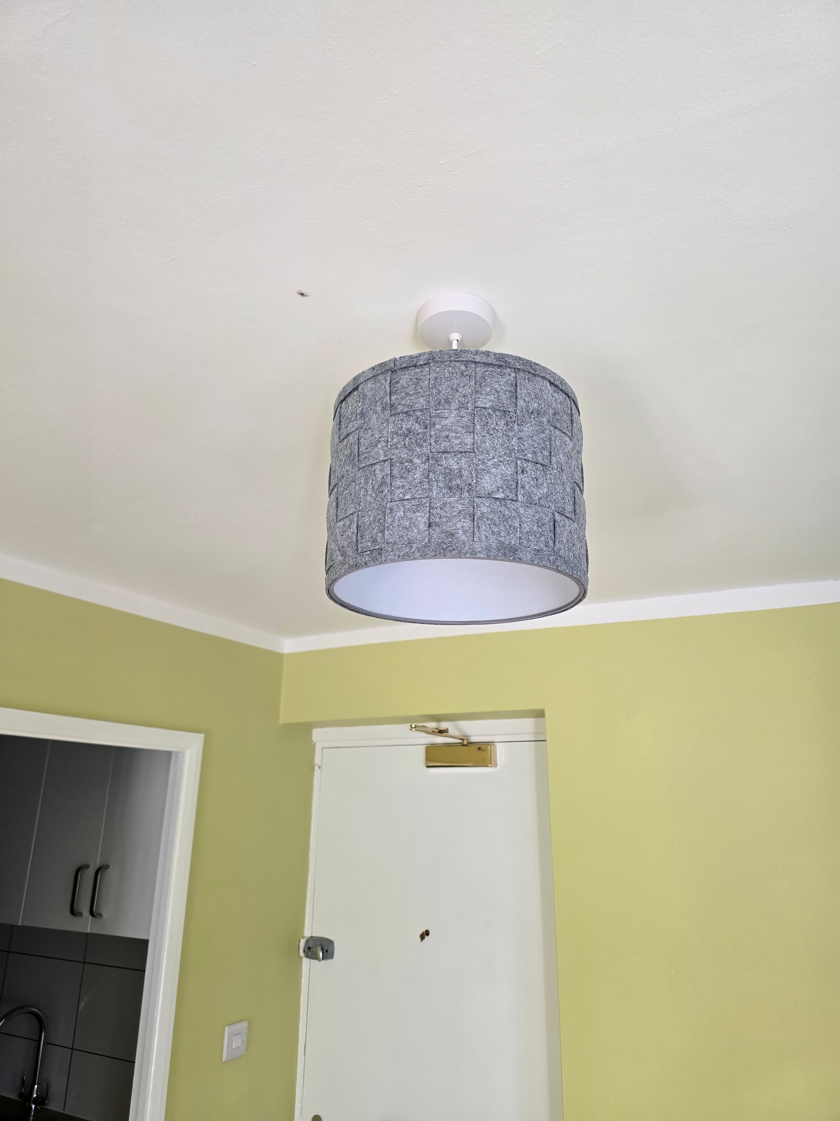 Wall light fitting installed in hallway