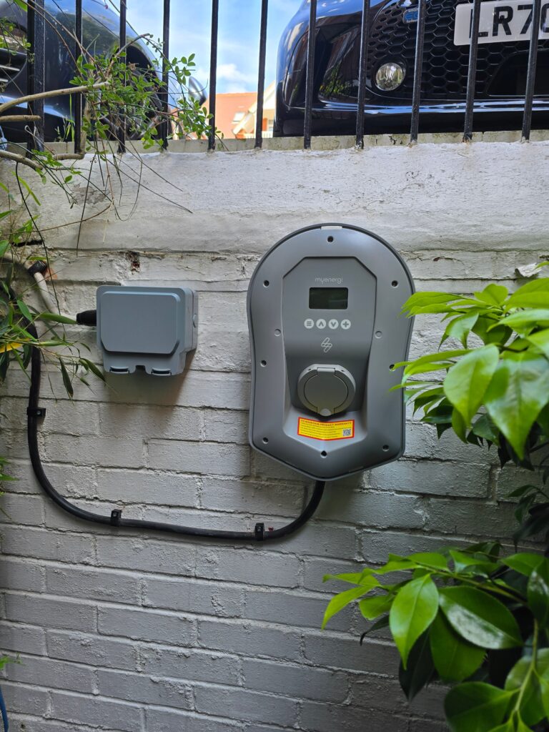 EV charger installed on an exterior wall